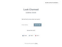 Tablet Screenshot of lookcharmed.com